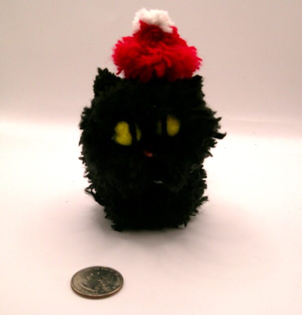 Black Sitting Puffball Cat with Santa Hat - Image 3