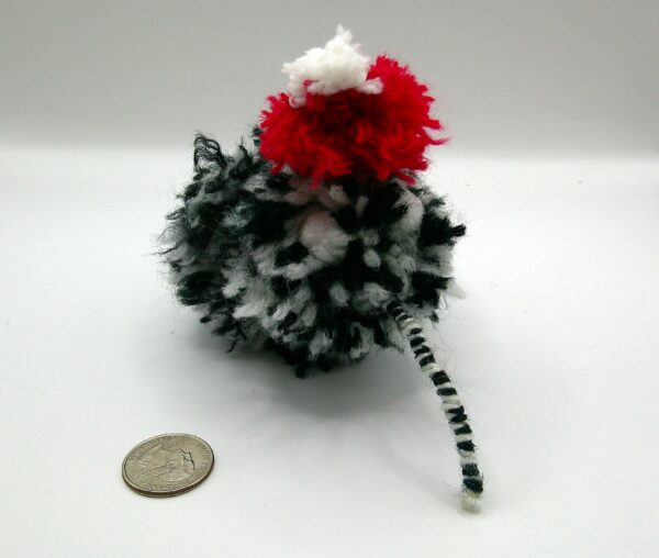 Black and White Puffball Weevil with a Santa Hat - Image 3