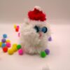 White Sitting Puffball Cat with Santa Hat